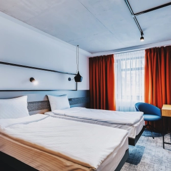 Stylish double room at the IQ Hotel in Kyiv with a workplace and modern interior