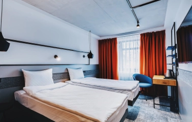 Stylish double room at the IQ Hotel in Kyiv with a workplace and modern interior