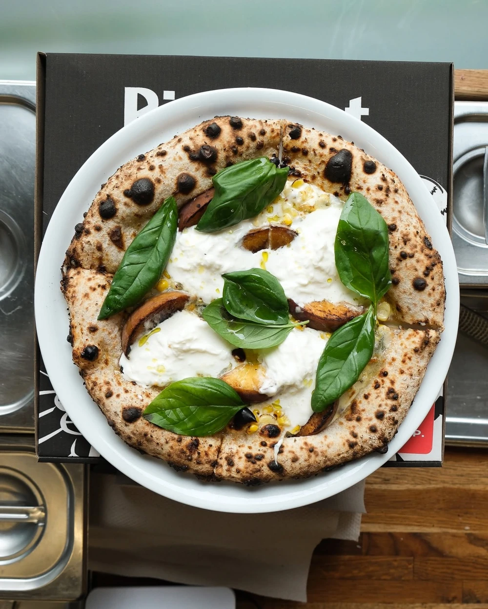 Pizza with mozzarella and basil from Pie Spot