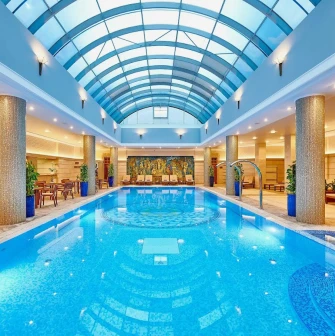 Premier Palace - indoor swimming pool area with decor