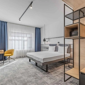 Stylish double room at the IQ Hotel in Kyiv with a workplace and modern interior
