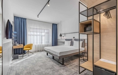 Stylish double room at the IQ Hotel in Kyiv with a workplace and modern interior