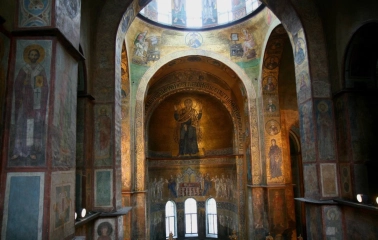 Ancient frescoes and the dome part of St. Sophia Cathedral in Kyiv with the image of Oranta