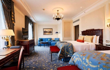 Spacious room with two beds at the Fairmont Grand Hotel in Kyiv