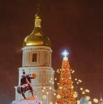 Monument to Bogdan Khmelnytsky in Kyiv - festive night view with the Bogdan Khmelnytsky monument, Christmas tree, and Saint Sophia Bell Tower