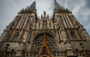 Bottom view of the facade of St. Nicholas Church with details of Gothic architecture