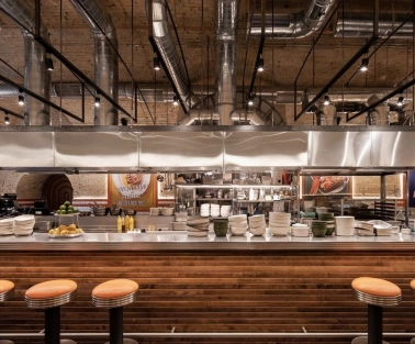 Bar counter with open kitchen at Fish Fetish restaurant in Kyiv