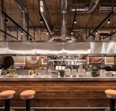 Bar counter with open kitchen at Fish Fetish restaurant in Kyiv