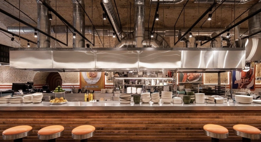 Bar counter with open kitchen at Fish Fetish restaurant in Kyiv