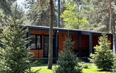 Private cottage of the Sobi Club spa complex among pine trees
