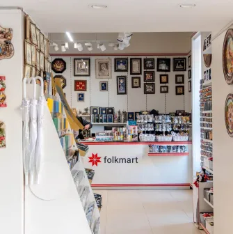 The modern white checkout counter at Folkmart store in Kyiv