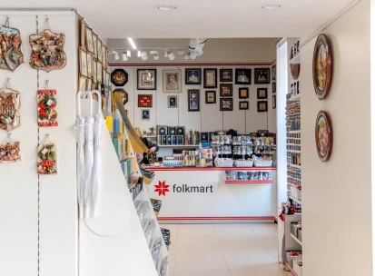 The modern white checkout counter at Folkmart store in Kyiv