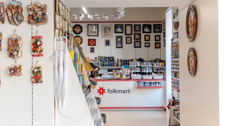 The modern white checkout counter at Folkmart store in Kyiv