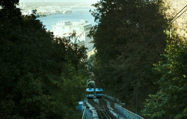 Kyiv Funicular - two carriages passing on tracks with a view of the Dnipro