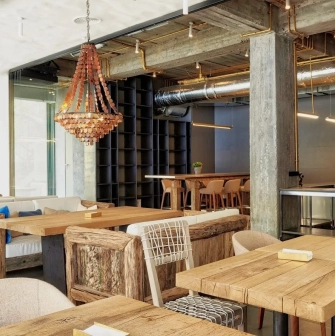 SHO - bright dining space offering a broad panoramic view through large glass windows