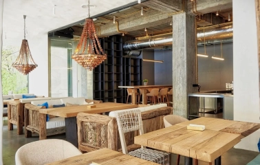 SHO - bright dining space offering a broad panoramic view through large glass windows