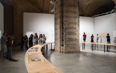 Exhibition hall of Mystetskyi Arsenal with arches and visitors