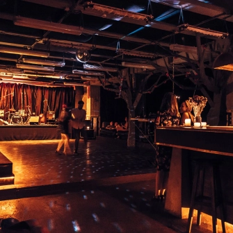 Dance floor and bar area at Closer Club in Kyiv