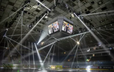 Palats Sportu in Kyiv - dramatic white spotlights beaming through the darkness onto the ice rink