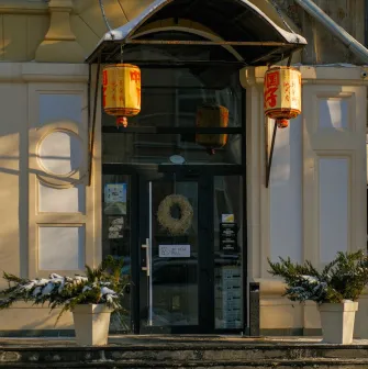 The entrance to China Hi restaurant with red lanterns in Kyiv