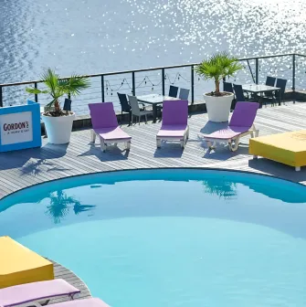Pool with turquoise water and sun loungers on the Sungrilla Beach terrace