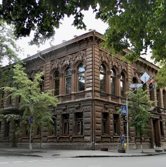 Chocolate house - historic brown mansion with rich Renaissance decor on the facade