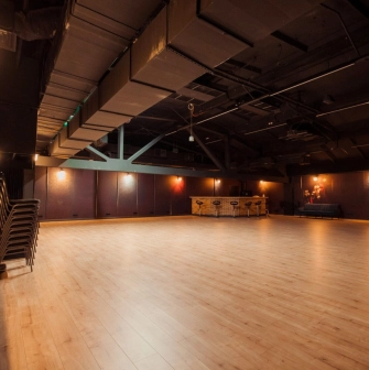 Pochayna Event Hall - main stage with technical equipment and lighting setup