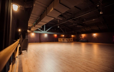 Pochayna Event Hall - main stage with technical equipment and lighting setup