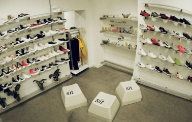 A wall with a large selection of sneakers in the Konyk.dept store in Kyiv