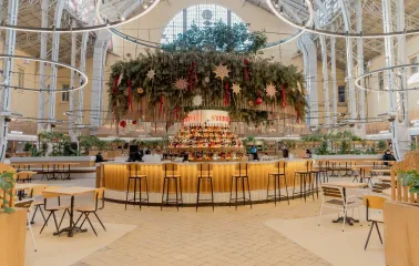 Circular bar with Christmas decorations in Bessarabskyi Market hall in Kyiv
