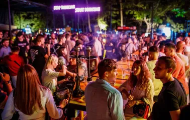 Fifty Club - guests smoking hookah and talking at outdoor bar