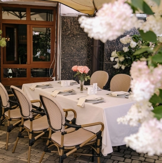 Etre Sofie - luxurious dining area with plush seating and warm, refined decor