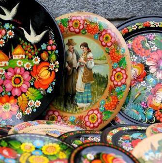Painted decorative plates in the style of Petrykivka at the souvenir market