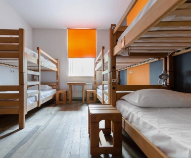 Dream Hostel - room with four bunk beds and a window