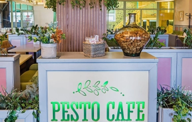 Pesto Cafe - welcoming reception area with comfortable seating and stylish decor