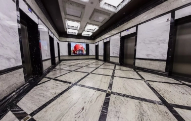 Senator Business Center in Kyiv - elevator hall with marble walls and geometric floor