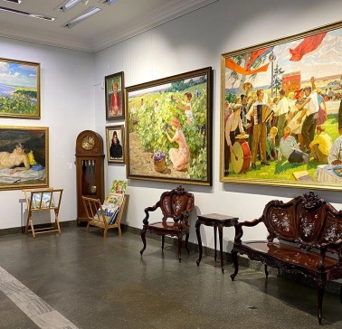 Soviet-era paintings and antique furniture at L'Art Gallery in Kyiv