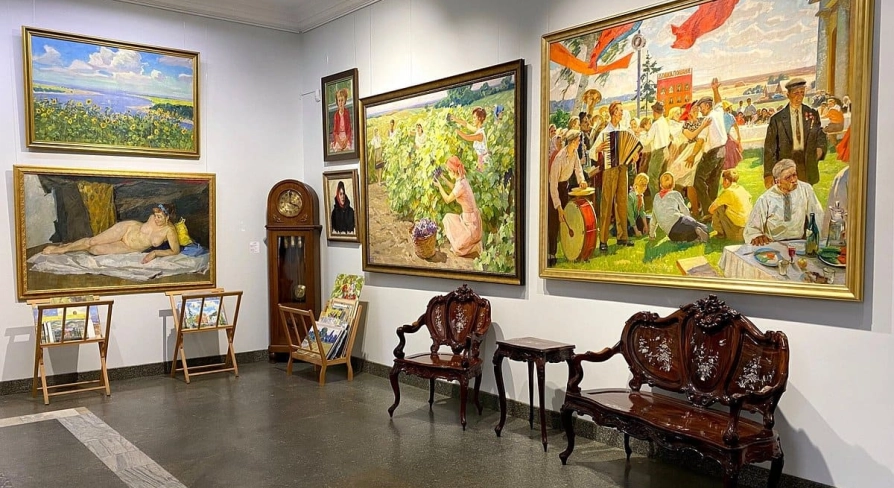 Soviet-era paintings and antique furniture at L'Art Gallery in Kyiv