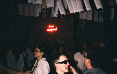 Vechirochka - party interior with papers and ties hanging from ceiling