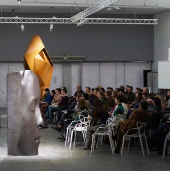 TSM m17 - large modern sculpture head placed near the building entrance