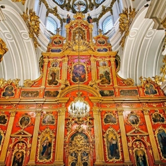 Gilded iconostasis with icons in the Baroque interior of St. Andrew's Church in Kyiv