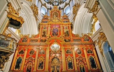 Gilded iconostasis with icons in the Baroque interior of St. Andrew's Church in Kyiv