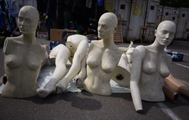 Mannequins on the floor of a flea market near Pochaina in Kyiv
