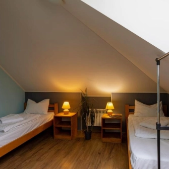 Double attic room with two twin beds at Dream Hostel in Kyiv