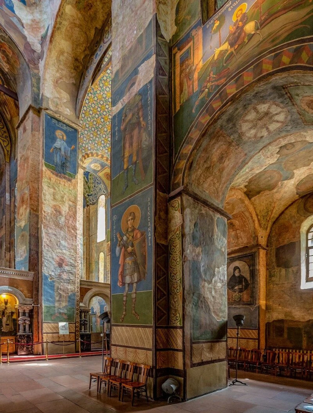 St. Cyril's Church in Kyiv - tall interior columns covered in ancient religious frescoes