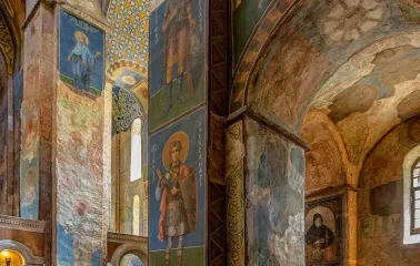 St. Cyril's Church in Kyiv - tall interior columns covered in ancient religious frescoes