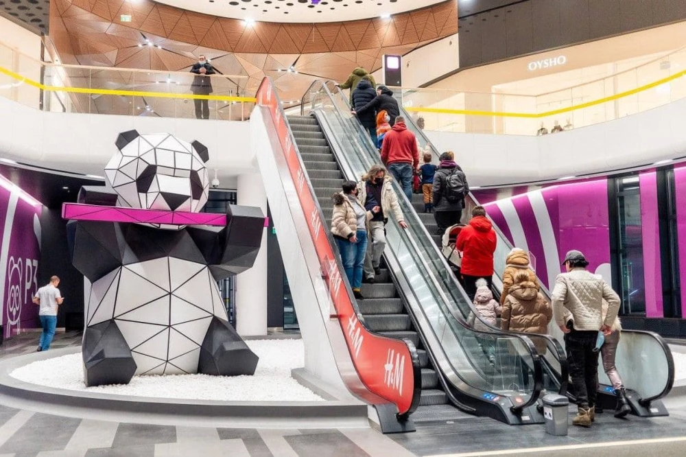 A panda figure near the escalator in the Respublika Park shopping center in Kyiv
