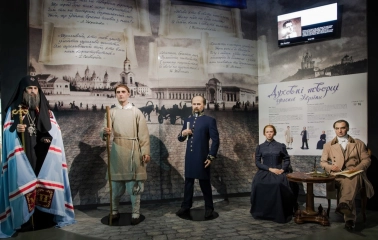 Muzei Stanovlennia Ukrainskoi Natsii in Kyiv - lifelike wax figures of prominent 19th-century Ukrainian intellectuals standing together against a background of poetic quotes