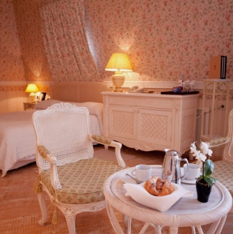 Opera Hotel - elegantly set restaurant table with fine china and silverware
