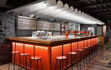 Punkraft - close-up view of the bar counter featuring many beer tap handles